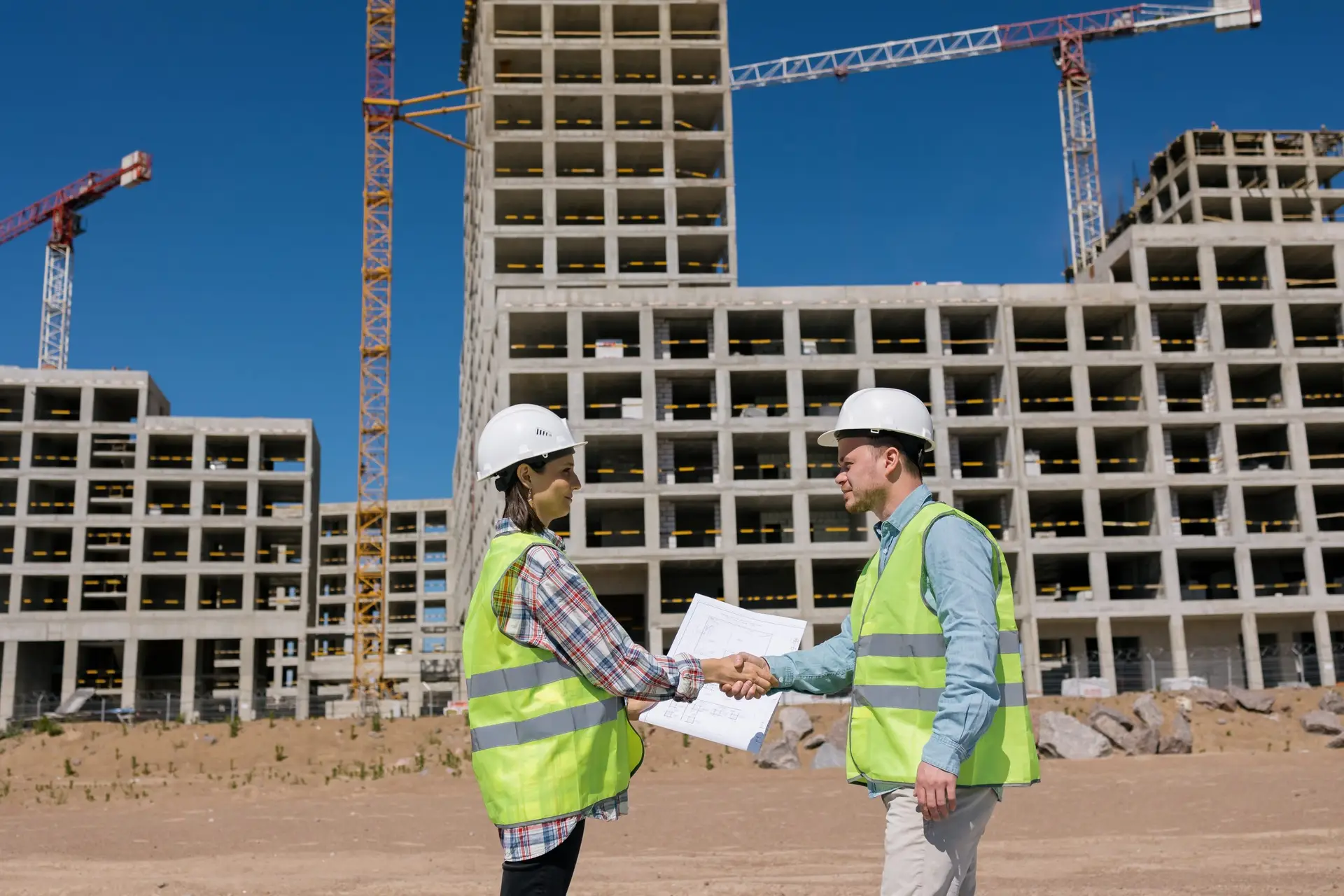 looking-at-the-construction-plan-at-the-constructi-2022-11-14-00-21-37-utc